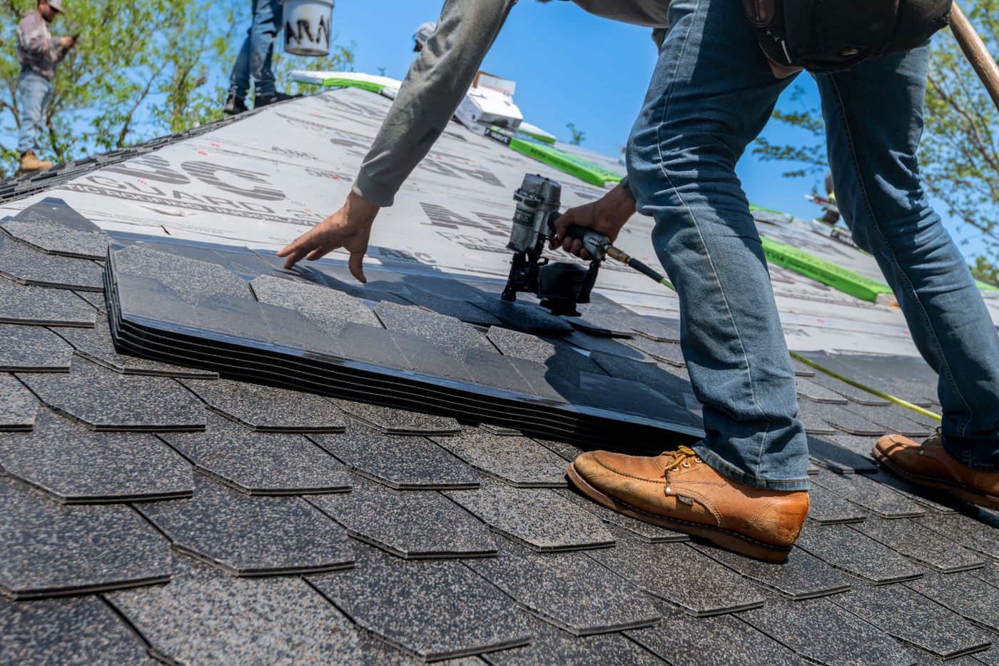 Roofing professionals at work
